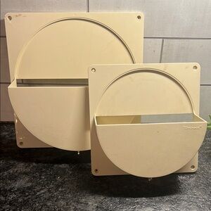 Tupperware lid holders. 10” and 7.5 wide Beige Wall-Mounted. Exc condition